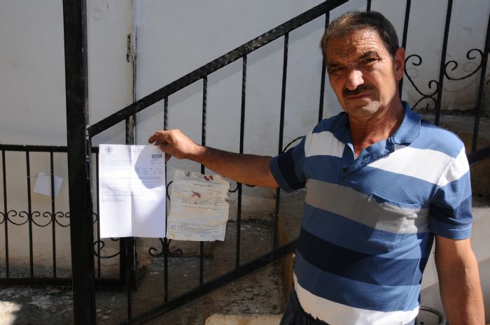 (ZEL)-MHPli belediye 44 yllk eve kaak ilemi balatt 